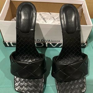 Black slip on heel in black size 9